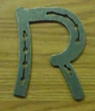 Horse shoe letter R unfinished