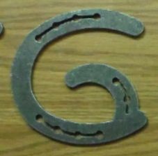 Horse shoe letter G unfinished